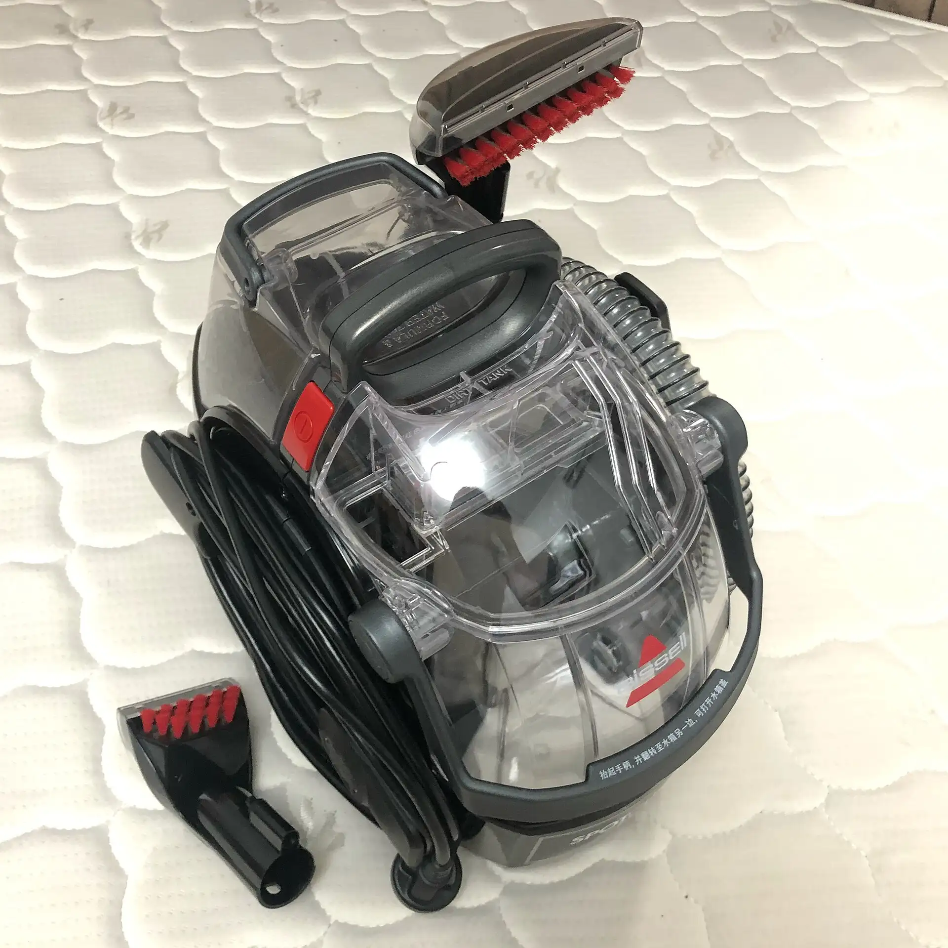 Portable spot-cleaning extractor machine